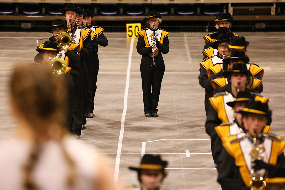 Kayla Durham lines up in between two columns